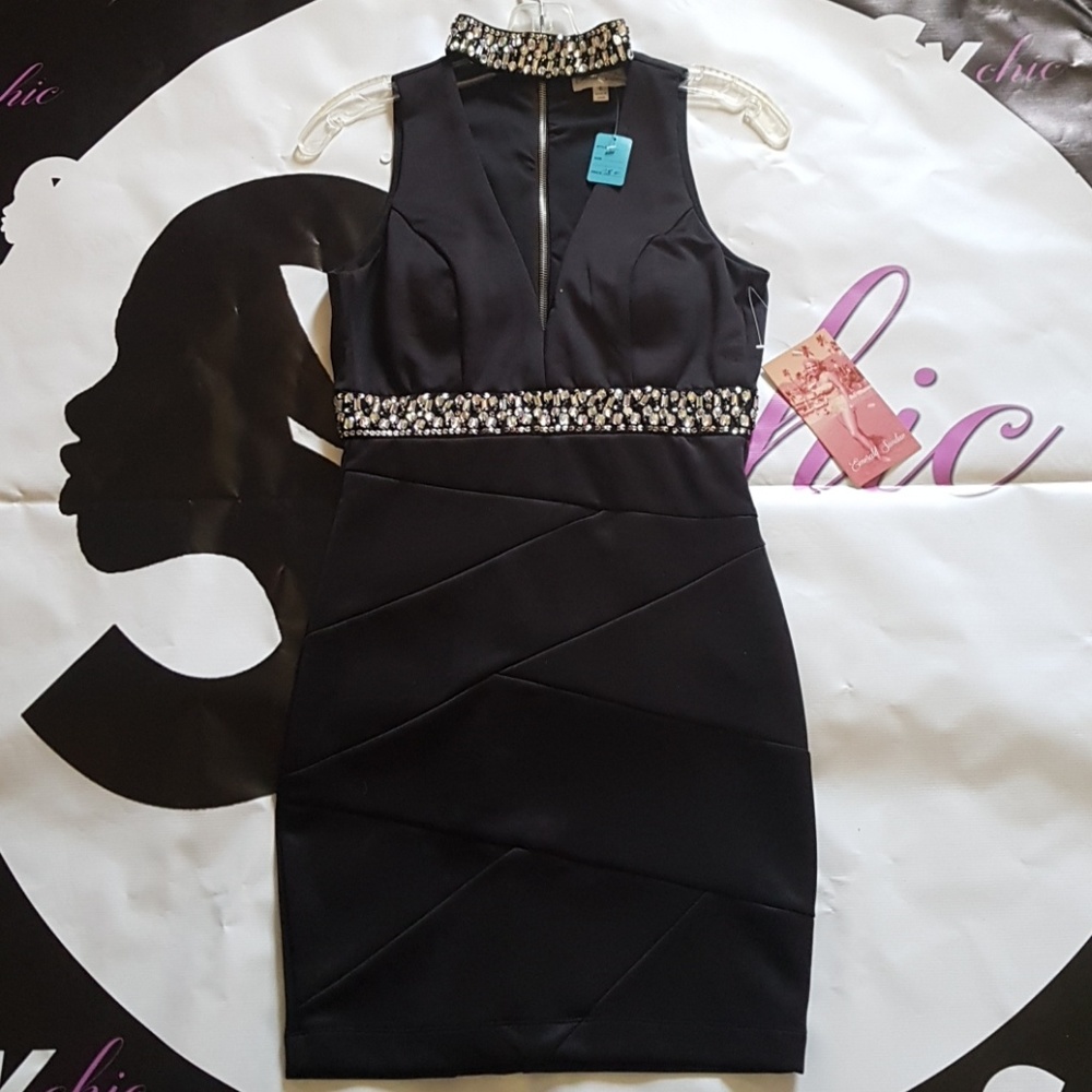 Emerald Sundae black dress with rindstone. New
